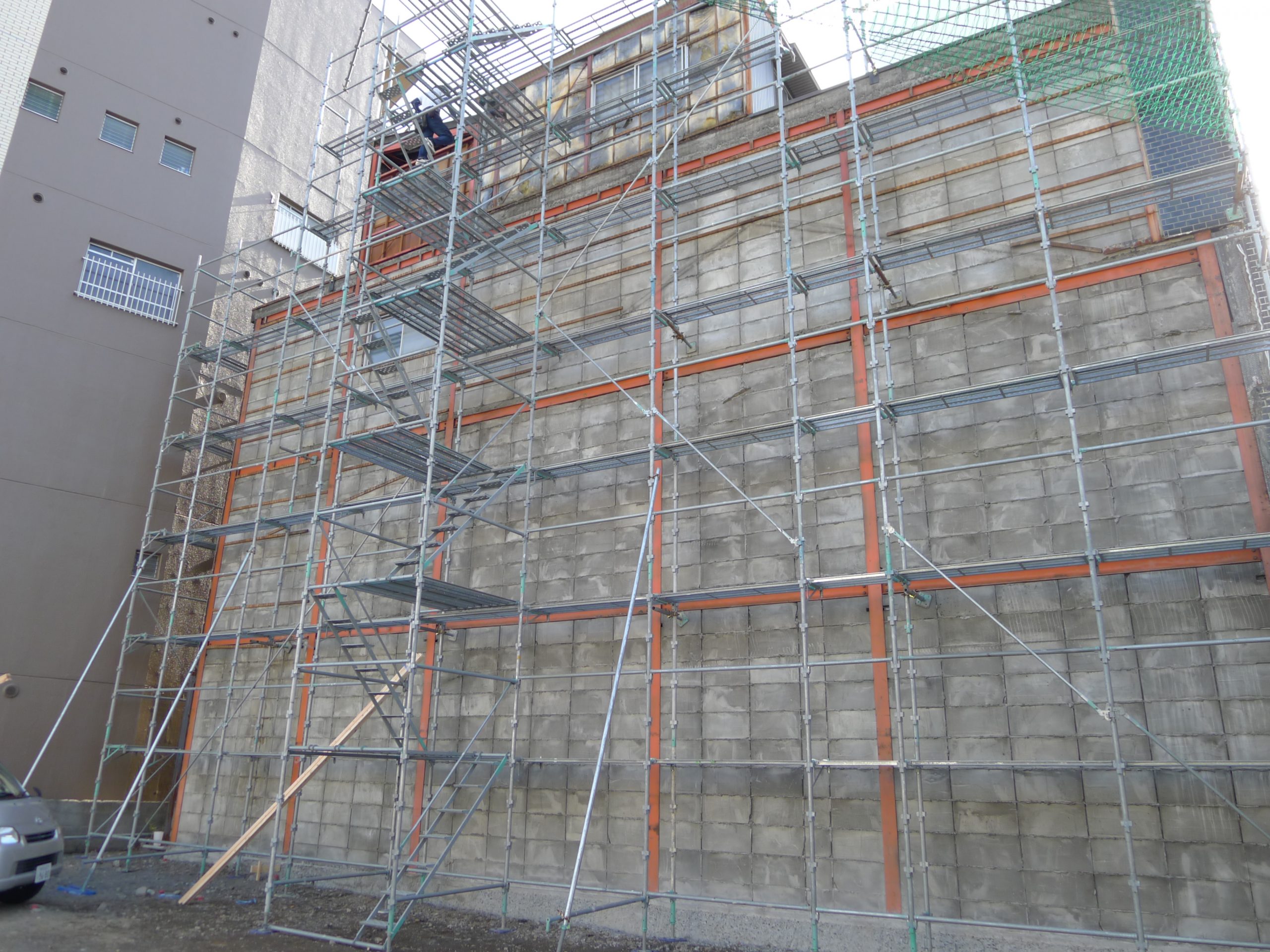 静岡市葵区、ブロック造りの工場の外壁貼りと屋根のカバー工法を行いました。
